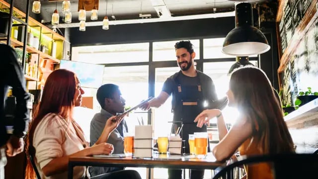 Happy customers enjoying their dining experience at a restaurant.